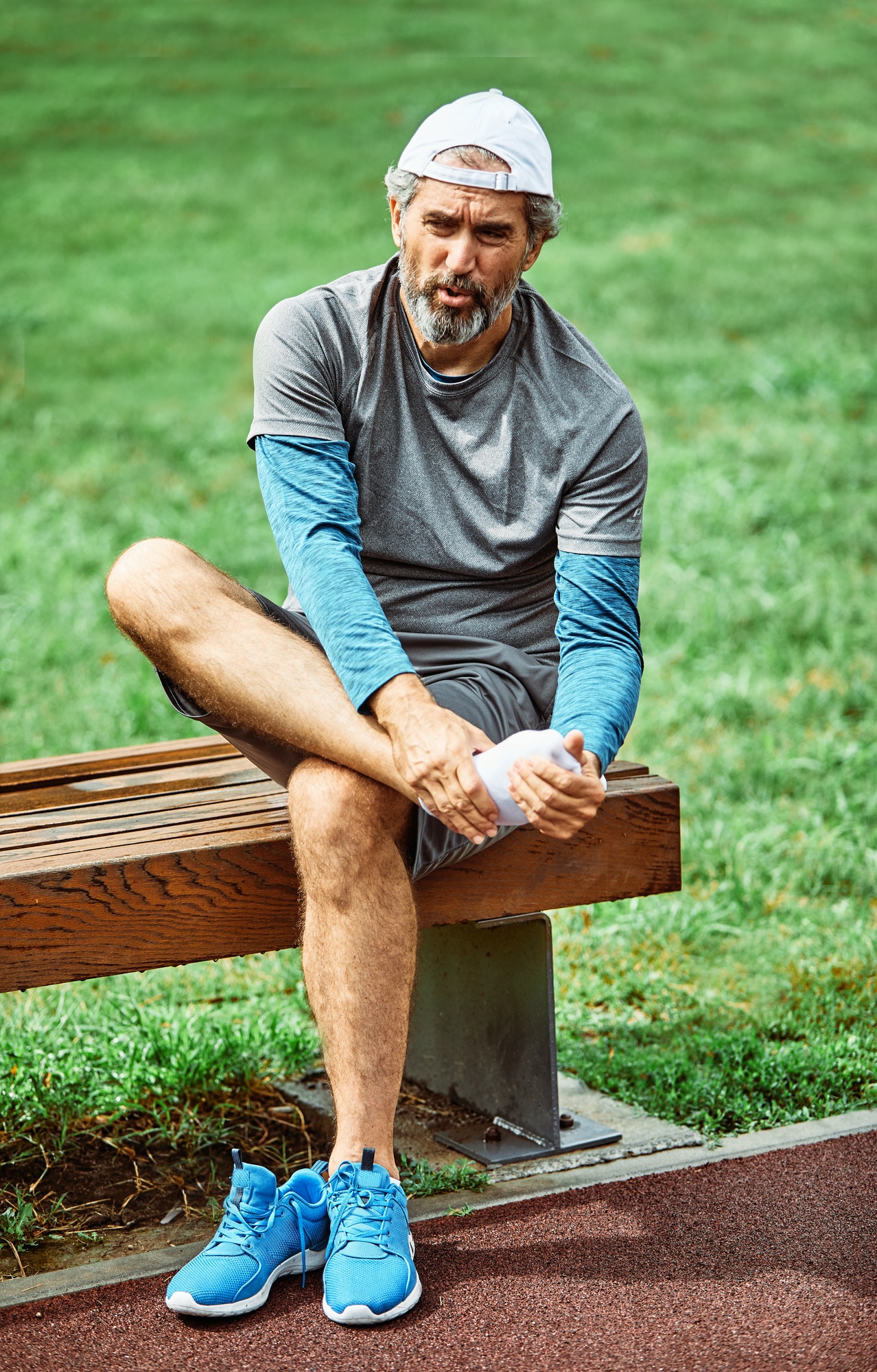 outdoor senior fitness man lifestyle active sport exercise injury pain ache leg knee ancle