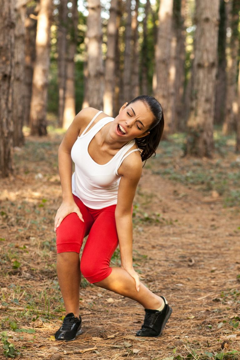 Young woman after running had injuries